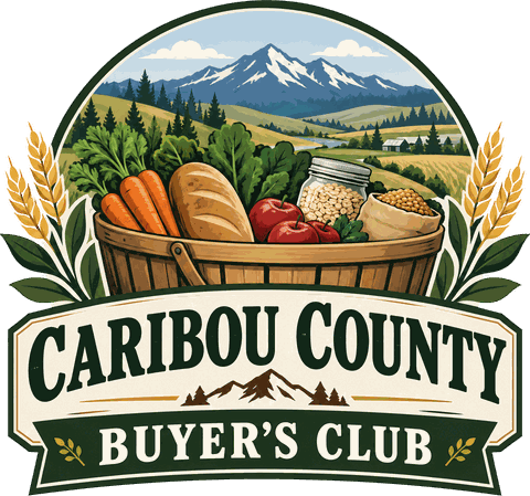 Caribou County Buyers Club logo: a basket of carrots, bread, apples, and grain in front of mountains and farmland.
